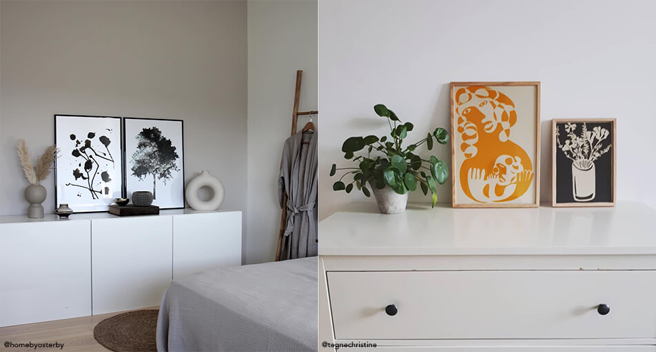 Tableaux appuyés contre le mur sur commode dans chambre